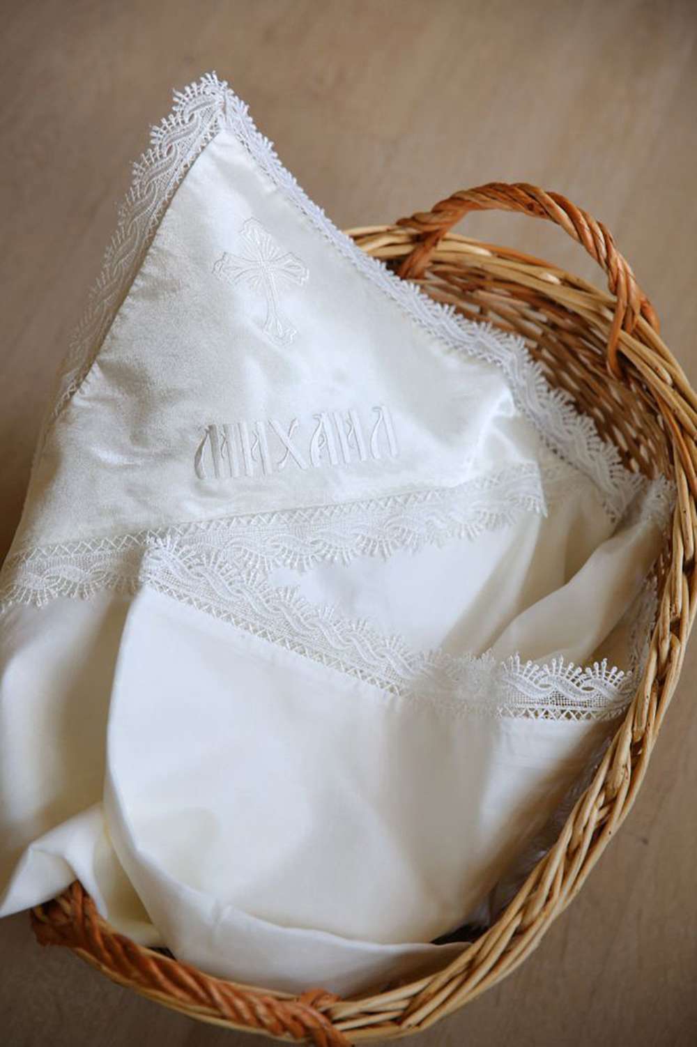 Baptism blanket with embroidered name made from church fabric
