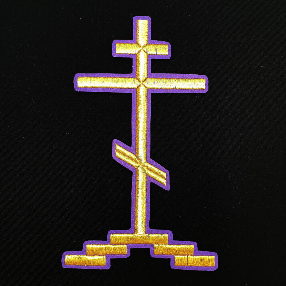 Embroidered cross on the throne
