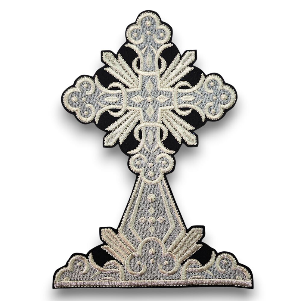 Large embroidered cross on the throne