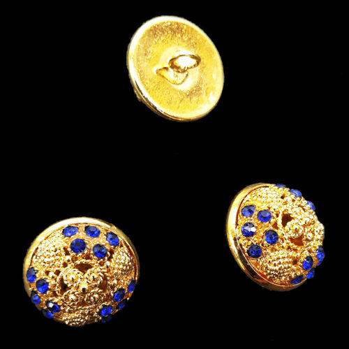 Ґудзики золотого кольору з синім камінням